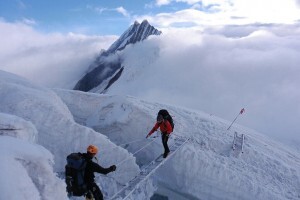 crossing a crevasse using ladders on Mansalu expedition